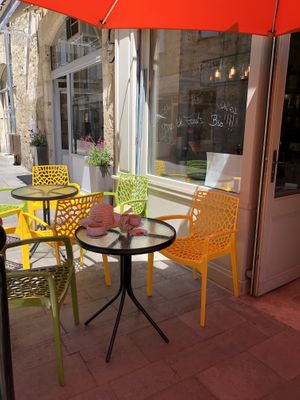 Nice seating area on pedestrianised road where you can watch the world go by.  at L'un Pour Tous in Condom