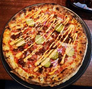 Cheeseburger Pizza with added vegan bacon at Red Sparrow Pizza in Prahran