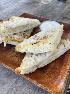 Cheesy garlic bread   at Russell's by Eat Healthy Kauai in Wailua
