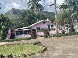 The outside from the parking lot, it’s set back off the main roadd  at Russell's by Eat Healthy Kauai in Wailua