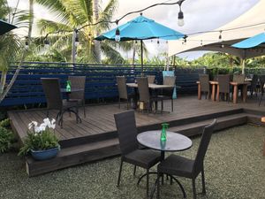 Outdoor seating area at Russell's by Eat Healthy Kauai in Wailua