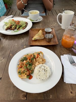 Avocado toast, garlic toast, Thai tofu with peanut sauce, soup of the day. All delish!! The world needs more places like this! at Russell's by Eat Healthy Kauai in Wailua