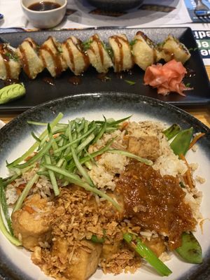 Fried rice with tofu and sushi   at Wagamama in Doha