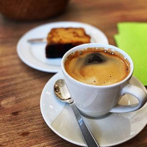 Long Black and a slice of ginger cake  at Serenity Bean in Moreton-in-marsh