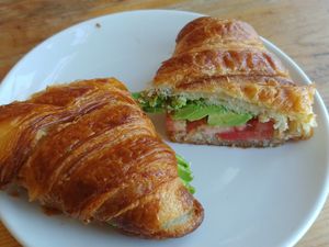$3.50 Veggie Breakfast Sandwich on a croissant 🥐: Avocado, tomato and onion.... There was no onion, really poor service at Cafe Franco in San Francisco
