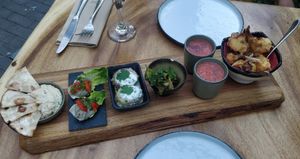 Starter: Hummus, Baba ghanoush, grilled zucchini with coconut cream, grilled mini romaine lettuce, watermelon gazpacho, fried cauliflower in tempura batter at De Levensboom in Hasselt