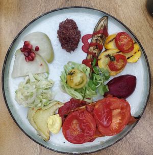 Main course: Black rice, grilled eggplant and zucchini, zucchini pasta, beetroot puree, grilled tofu with tomato sauce, pumpkin with curcuma mayonnaise, Chinese cabbage, white beet at De Levensboom in Hasselt