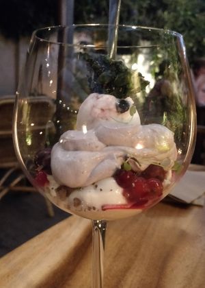 Dessert: spirulina brittle, rice milk ice cream, white chocolate mousse, currants and pomegranate seeds (don't remember layer in the middle) at De Levensboom in Hasselt