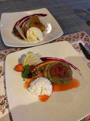 Dessert - fried banana and fruit pancakes with vegan ice cream at BeingSattvaa in Ubud