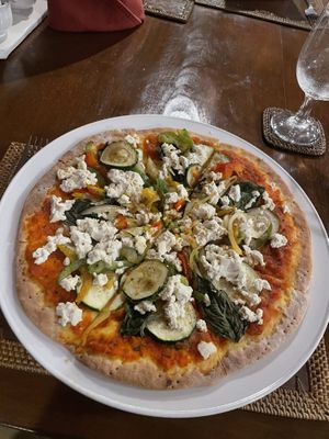 Balinese tofu pizza (without cheese)  at BeingSattvaa in Ubud