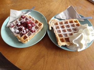 Vegan waffles with vegan whipped cream and cherries at Cafe Küstenkind in Greifswald
