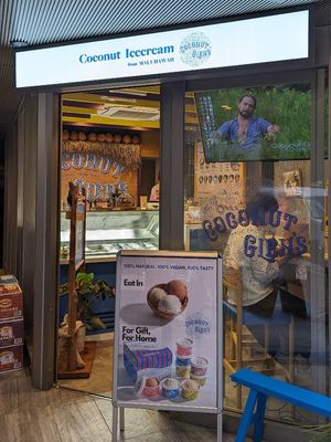 There are some seats in the corner at Coconut Glen's in Tokyo
