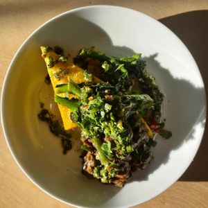 Mushroom ragu, crispy polenta, chilli and garlic sautéed purple sprouting broccoli pesto (vegan, GF) at CAST Café in Helston