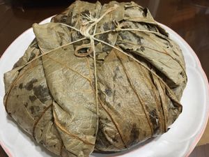2020 Chinese New Year’s Eve dish: 
youfan wrapped in water lily leaf at Yòu Dān 又丹蔬食創意料理 in Taipei