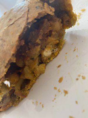Inside the Cauliflower and potato onion bhaji pasty at Lenny's of Rochester in Rochester