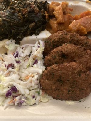 Slaw, greens, sweet potatoes, and some sort of dinner patty entree at Vegan Mob in Oakland