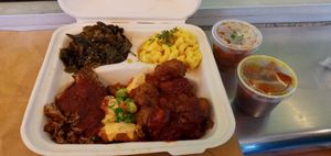 Collard greens, Mac and cheese, spaghetti with "meat" sauce, vegan brisket, shrimp, and rib tips, and they threw in candied yams at Vegan Mob in Oakland