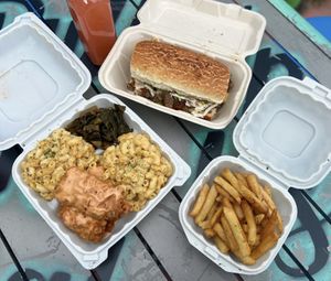 Spicy fried chicken Large mob plate with Greens and double Smackaroni, Divisadero Cheesesteak sandwich  at Vegan Mob in Oakland