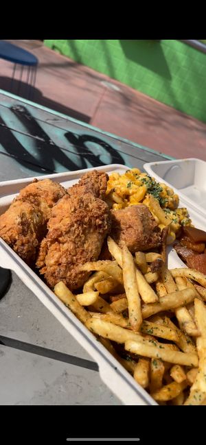 Large Mob Plate with Spicy Fried Chicken, Smackaroni, Mob Fries, and Sweet Candied Yams.   at Vegan Mob in Oakland