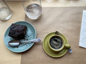 Decadent chocolate brownie and good coffee  at apeti - Ségur in Paris