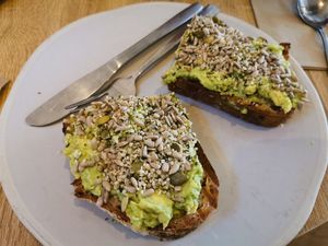Avocado toast very thick at Oliver Green - East in Amsterdam