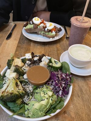 Avocado on toast, miso bowl with added tofu. Drinks were very berry smoothie and matcha latte    at Oliver Green - East in Amsterdam
