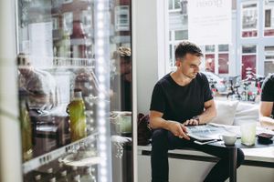 Fridge full of fresh juices  at Oliver Green - East in Amsterdam