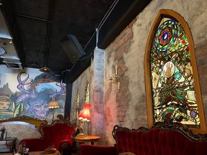 Fantastic and unique decor, like we were eating in an abandoned church at Dark Arts Cafe & Bar in Coffs Harbour