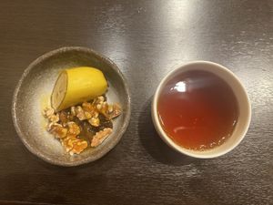 Golden berries with banana and some mango sauce over the top with walnuts!  at Goen no Mori in Yugawara