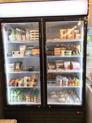 Tofu, tempeh, vegan cheese and other refrigerated products. at Kind Earth in Llanelli