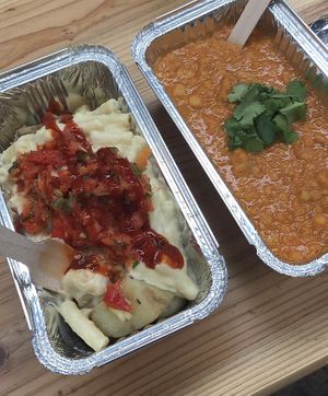 ‘Dirty pot’ mac and cheese loaded potatoes 
And coconut dhaal  at Temperance in Halifax
