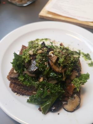 Garlic forest mushrooms, with kale and hazelnuts on rye. at Temperance in Halifax