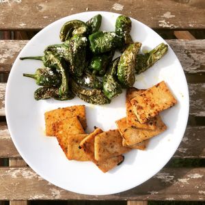 Padrón peppers with marinated tofu slices at Casa Divina in Tenerife
