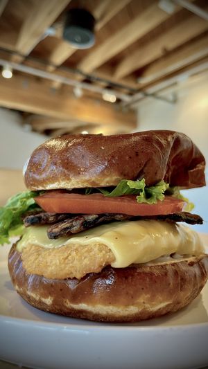 CHIK'N BACON RANCH
Crispy chik'n filet, organic tempeh bacon, smoked Gouda cheese, organic lettuce, organic tomato and creamy ranch on a toasted pretzel bun  at Veggie Grill by Next Level in Burbank