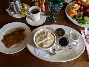 Cream of wheat (comes with brown sugar, raisins, & I asked for oat milk), and side of hash browns at Madonna Inn in San Luis Obispo