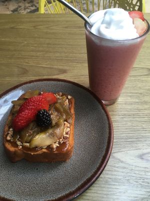 French toast and a drink made with coconut kefir and strawberries   at Plantasia in Mexico City