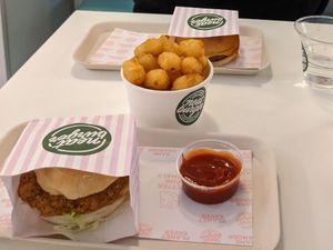 Chicken burger and tator tots at Neat Burger - Oxford Circus in London