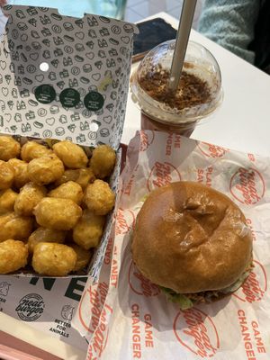Vegan chicken burger and tater tots   at Neat Burger - Oxford Circus in London
