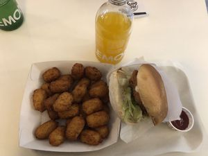 Chicken burger, tater tots, lemonaid  at Neat Burger - Oxford Circus in London