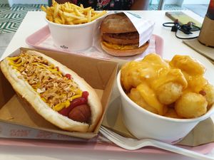 The Neatdog and tater tots with cheese. And my friend had the big stack with fries. Both great!  at Neat Burger - Oxford Circus in London