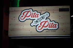 Sign with logo at Pita Pita Grillstore in Mannheim
