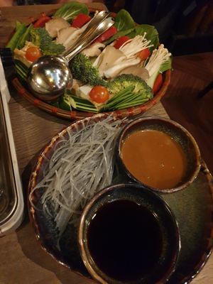 Rice noodles with two different dips, vegetables, tofu at Soy in Munich