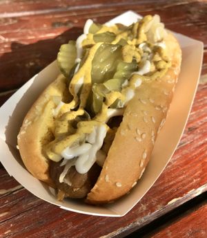 The Jekyll & Hyde (smoked apple sausage) w/ condiments. Delicious✨ at The Frankenstand - Mobile Cart in Los Angeles