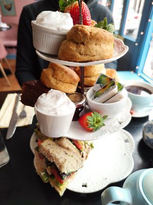 Vegan afternoon tea with sandwiches, scones, gingerbread, jam and whipped cream at Halladay's Tearooms in Southampton