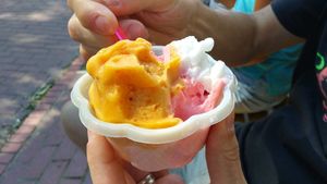 Mango/passiin fruit + lime + strawberry. Sorrt, we couldn't resist eating before the picture was taken at Le St-Crème in Quebec