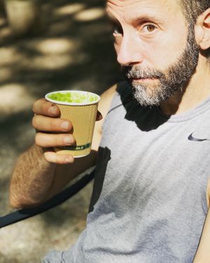 Hubby with green drink at Rail Trail Cafe in New Paltz