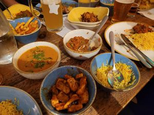Top left clockwise, soya curry, soya keema, rice, mogo chips at Tap & Tandoor in Solihull