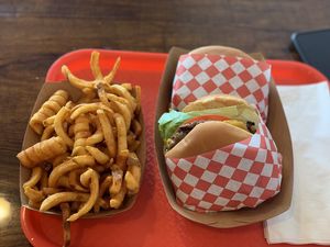 Cheeseburger and curly fries at VOWburger in Los Angeles
