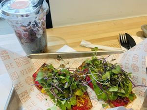 Majikal chia pudding and beet hummus on sweet potato toast at Vibe Organic Kitchen & Juice in Dana Point
