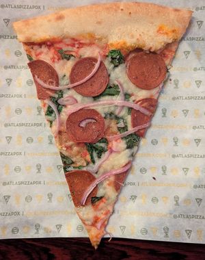 vegan pepperoni, spinach, and red onion at Atlas Pizza - Foster Rd in Portland